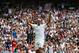 LONDON, ENGLAND - JULY 02: Roger Federer of Switzerland celebrates after winning his Gentlemen's Singles quarter-final match against Stan Wawrinka of Switzerland on day nine of the Wimbledon Lawn Tennis Championships at the All England Lawn Tennis and Croquet Club at Wimbledon on July 2, 2014 in London, England. (Photo by Jan Kruger/Getty Images)