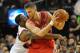 PORTLAND, OR - APRIL 27: Wesley Matthews #2 of the Portland Trail Blazers reaches in on Chandler Parsons #25 of the Houston Rockets in the fourth quarter of Game Four of the Western Conference Quarterfinals during the 2014 NBA Playoffs at the Moda Center on April 27, 2014 in Portland, Oregon. The Blazers won the game 123-120. NOTE TO USER: User expressly acknowledges and agrees that, by downloading and or using this photograph, User is consenting to the terms and conditions of the Getty Images License Agreement. (Photo by Steve Dykes/Getty Images)