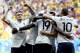 France's Paul Pogba (19) celebrates with teammates after scoring his side's opening goal during the World Cup round of 16 soccer match between France and Nigeria at the Estadio Nacional in Brasilia, Brazil, Monday, June 30, 2014. (AP Photo/David Vincent)