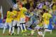 CORRECTS GOALIE NAME TO JULIO CESAR -Brazil's goalkeeper Julio Cesar celebrates with team mates at the end of the World Cup round of 16 soccer match between Brazil and Chile at the Mineirao Stadium in Belo Horizonte, Brazil, Saturday, June 28, 2014. Brazil won 3-2 on penalties.(AP Photo/Frank Augstein)