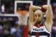 Washington Wizards center Marcin Gortat reacts after a play in the closing minutes of Game 6 of an Eastern Conference semifinal NBA basketball playoff series against the Indiana Pacers in Washington, Thursday, May 15, 2014. The Pacers defeated the Wizards 93-80 to advance to the Eastern Conference Finals. (AP Photo/Alex Brandon)