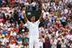 LONDON, ENGLAND - JULY 02: Novak Djokovic of Serbia celebrates after winning his Gentlemen's Singles quarter-final match against Marin Cilic of Croatia on day nine of the Wimbledon Lawn Tennis Championships at the All England Lawn Tennis and Croquet Club at Wimbledon on July 2, 2014 in London, England. (Photo by Al Bello/Getty Images)