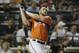 National League's Bryce Harper, of the Washington Nationals, watches his sixth home run in the third round of the MLB All-Star baseball Home Run Derby, on Monday, July 15, 2013 in New York. (AP Photo/Matt Slocum)