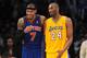 LOS ANGELES, CA - DECEMBER 29: Carmelo Anthony #7 of the New York Knicks and Kobe Bryant #24 of the Los Angeles Lakers look on during their game at Staples Center on December 29, 2011 in Los Angeles, California. NOTE TO USER: User expressly acknowledges and agrees that, by downloading and/or using this Photograph, user is consenting to the terms and conditions of the Getty Images License Agreement. Mandatory Copyright Notice: Copyright 2011 NBAE (Photo by Juan Ocampo/NBAE via Getty Images)