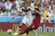 Ghana's Sulley Muntari, right, challenges Germany's Toni Kroos during the group G World Cup soccer match at the Arena Castelao in Fortaleza, Brazil, Saturday, June 21, 2014. (AP Photo/Matthias Schrader)