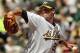 Oakland Athletics' Mark Mulder works against the Tampa Bay Devil Rays in the third inning Sunday, Aug. 29, 2004, in Oakland, Calif. The A's won the game, 9-6, sweeping the series from Tampa Bay. (AP Photo/Ben Margot)