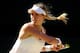 LONDON, ENGLAND - JULY 03: Eugenie Bouchard of Canada during her Ladies' Singles semi-final match against Simona Halep of Romania on day ten of the Wimbledon Lawn Tennis Championships at the All England Lawn Tennis and Croquet Club on July 3, 2014 in London, England. (Photo by Al Bello/Getty Images)