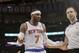 New York Knicks' Carmelo Anthony (7) argues a call during the second half of an NBA basketball game against the Brooklyn Nets Wednesday, April 2, 2014, in New York. The Knicks won the game 110-81. (AP Photo/Frank Franklin II)