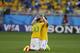 Brazil's Neymar and Brazil's David Luiz celebrate after the World Cup round of 16 soccer match between Brazil and Chile at the Mineirao Stadium in Belo Horizonte, Brazil, Saturday, June 28, 2014. Brazil won 3-2 on penalties. Brazil won 3-2 on penalties.(AP Photo/Frank Augstein)