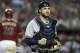 Milwaukee Brewers catcher Jonathan Lucroy, right, clutches his fist after Arizona Diamondbacks Miguel Montero (26) strikes out to end the inning during a baseball game on Wednesday, June 18, 2014, in Phoenix. The Diamondbacks defeated the Brewers 4-3. (AP Photo/Ralph Freso)