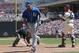 Kansas City Royals' Raul Ibanez heads to the dugout after his solo home run off Minnesota Twins pitcher Casey Fien in the eighth inning of a baseball game, Wednesday, July 3, 2014, in Minneapolis. The Royals won 4-0. (AP Photo/Jim Mone)