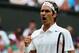 LONDON, ENGLAND - JULY 02: Roger Federer of Switzerland celebrates during his Gentlemen's Singles quarter-final match against Stan Wawrinka of Switzerland on day nine of the Wimbledon Lawn Tennis Championships at the All England Lawn Tennis and Croquet Club at Wimbledon on July 2, 2014 in London, England. (Photo by Jan Kruger/Getty Images)