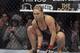 In this Feb. 22, 2014 photo, Ronda Rousey prepares for a UFC 170 mixed martial arts women's bantamweight title fight against Sara McMann in Las Vegas. Rousey is constructing her escape hatch out of mixed martial arts, even if she’s not planning to use it just yet. The UFC bantamweight champion has turned her celebrity and charisma into a budding career as an action film star. Many MMA fighters dream about it, but Rousey is actually doing it: With upcoming parts in “The Expendables 3,” the newest “Fast and Furious” chapter and the “Entourage” movie, she’s seeking success outside the cage even while her fighting career is near its peak. (AP Photo/Isaac Brekken)
