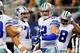 ARLINGTON, TX - DECEMBER 15: Tight end Jason Witten #82 celebrates a touchdown with wide receiver Dez Bryant #88 and center Travis Frederick #72 of the Dallas Cowboys against the Green Bay Packers in the first quarter during a game at AT&T Stadium on December 15, 2013 in Arlington, Texas. (Photo by Ronald Martinez/Getty Images)