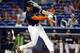 CORRECTS SPELLING OF FIRST NAME TO GIANCARLO, NOT GIANCARIO - Miami Marlins' Giancarlo Stanton breaks his bat during the first inning of a baseball game against the New York Mets, Saturday, June 21, 2014, in Miami. (AP Photo/J Pat Carter)