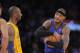 Los Angeles Lakers guard Kobe Bryant, left, and New York Knicks forward Carmelo Anthony prior to their NBA basketball game, Thursday, Dec. 29, 2011, in Los Angeles. The Lakers won 99-82. (AP Photo/Mark J. Terrill)