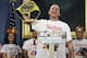 Seven-time hot dog eating champion, Joey Chestnut, poses while weighing in during a news conference to promote the upcoming Nathan's Famous Fourth of July International Hot-Dog Eating Contest tomorrow Thursday, July 3, 2014, at City Hall in New York. (AP Photo/Frank Franklin II)