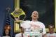 Seven-time hot dog eating champion, Joey Chestnut, poses while weighing in during a news conference to promote the upcoming Nathan's Famous Fourth of July International Hot-Dog Eating Contest tomorrow Thursday, July 3, 2014, at City Hall in New York. (AP Photo/Frank Franklin II)