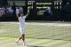 Novak Djokovic of Serbia celebrates defeating Grigor Dimitrov of Bulgaria in their men's singles semifinal match at the All England Lawn Tennis Championships in Wimbledon, London, Friday, July 4, 2014. (AP Photo/Ben Curtis)