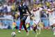 Germany's Bastian Schweinsteiger tries to slow France's Paul Pogba's attack during the World Cup quarterfinal soccer match at the Maracana Stadium in Rio de Janeiro, Brazil, Friday, July 4, 2014. (AP Photo/Kirsty Wigglesworth)
