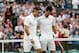 LONDON, ENGLAND - JULY 06: Roger Federer of Switzerland (L) is congratulated by Novak Djokovic of Serbia after his Gentlemen's Singles semi final match on day eleven of the Wimbledon Lawn Tennis Championships at the All England Lawn Tennis and Croquet Club on July 6, 2012 in London, England. (Photo by Clive Brunskill/Getty Images)