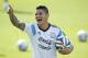 Argentina's Marcos Rojo talks to teammates during a training session in Vespasiano, near Belo Horizonte, Brazil, Tuesday, June 17, 2014. Argentina plays in group F of the 2014 soccer World Cup. (AP Photo/Victor R. Caivano)