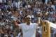 Roger Federer of Switzerland celebrates defeating Milos Raonic of Canada during their men’s singles semifinal match at the All England Lawn Tennis Championships in Wimbledon, London, Friday, July 4, 2014. (AP Photo/Pavel Golovkin)