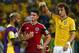 FORTALEZA, BRAZIL - JULY 04: Dani Alves (L) and David Luiz of Brazil console James Rodriguez of Colombia after Brazil's 2-1 win during the 2014 FIFA World Cup Brazil Quarter Final match between Brazil and Colombia at Castelao on July 4, 2014 in Fortaleza, Brazil. (Photo by Robert Cianflone/Getty Images)