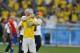 Brazil's coach Luiz Felipe Scolari embraces Brazil's Neymar after the World Cup round of 16 soccer match between Brazil and Chile at the Mineirao Stadium in Belo Horizonte, Brazil, Saturday, June 28, 2014. Brazil won 3-2 on penalties. (AP Photo/Frank Augstein)