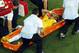 Brazil's Neymar is carried away after getting injured during the World Cup quarterfinal soccer match between Brazil and Colombia at the Arena Castelao in Fortaleza, Brazil, Friday, July 4, 2014. (AP Photo/Fabrizio Bensch, pool)