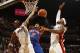 MIAMI, FL - MAY 09: Carmelo Anthony #7 of the New York Knicks goes to the basket against Chris Bosh #1 and LeBron James #6 of the Miami Heat in Game Five of the Eastern Conference Quarterfinals during the 2012 NBA Playoffs on May 9, 2012 at American Airlines Arena in Miami, Florida. NOTE TO USER: User expressly acknowledges and agrees that, by downloading and or using this photograph, User is consenting to the terms and conditions of the Getty Images License Agreement. Mandatory Copyright Notice: Copyright 2012 NBAE (Photo by Issac Baldizon/NBAE via Getty Images)