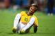 FORTALEZA, BRAZIL - JULY 04: Neymar of Brazil reacts after a challenge during the 2014 FIFA World Cup Brazil Quarter Final match between Brazil and Colombia at Castelao on July 4, 2014 in Fortaleza, Brazil. (Photo by Laurence Griffiths/Getty Images)