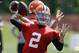 Cleveland Browns quarterback Johnny Manziel (2) passes during organized team activities at the NFL football team's facility in Berea, Ohio Tuesday, June 3, 2014. (AP Photo/Mark Duncan)
