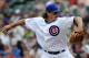 Jun 7, 2014; Chicago, IL, USA; Chicago Cubs starting pitcher Jeff Samardzija (29) pitches against the Miami Marlins during the first inning at Wrigley Field. Mandatory Credit: David Banks-USA TODAY Sports