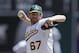 Oakland Athletics' Dan Straily works against the Seattle Mariners in the first inning of a baseball game Wednesday, May 7, 2014, in Oakland, Calif. (AP Photo/Ben Margot)