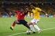 FORTALEZA, BRAZIL - JULY 04: Carlos Sanchez of Colombia challenges Marcelo of Brazil during the 2014 FIFA World Cup Brazil Quarter Final match between Brazil and Colombia at Castelao on July 4, 2014 in Fortaleza, Brazil. (Photo by Laurence Griffiths/Getty Images)
