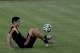 Colombia's James Rodriguez plays with a ball during a training session the day before the World Cup quarterfinals soccer match between Colombia and Brazil, in Fortaleza, Brazil, Thursday, July 3, 2014. (AP Photo/Natacha Pisarenko)