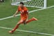 Netherlands' Klaas-Jan Huntelaar celebrates after scoring his side's second goal from the penalty spot during the World Cup round of 16 soccer match between the Netherlands and Mexico at the Arena Castelao in Fortaleza, Brazil, Sunday, June 29, 2014. Holland won 2-1 and advanced to the quarterfinal. (AP Photo/Themba Hadebe)