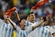 Argentina's Lionel Messi and teammates celebrate at the end of the World Cup quarterfinal soccer match between Argentina and Belgium at the Estadio Nacional in Brasilia, Brazil, Saturday, July 5, 2014. Argentina won 1-0. (AP Photo/Thanassis Stavrakis)