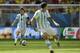 Argentina's Lionel Messi, left, runs with the ball during the World Cup quarterfinal soccer match between Argentina and Belgium at the Estadio Nacional in Brasilia, Brazil, Saturday, July 5, 2014. (AP Photo/Martin Meissner)