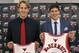 The Chicago Bulls' first and second round draft picks Cameron Bairstow (41) from Brisbane, Australia, and Creighton University star Doug McDermott, pose with their Bulls jerseys during a news conference Monday, June 30, 2014, in Deerfield, Ill. (AP Photo/Charles Rex Arbogast)