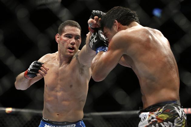 UFC 175 Results: Chris Weidman Proves His Point, Holds off Game Lyoto Machida