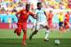 BRASILIA, BRAZIL - JULY 05: Divock Origi of Belgium challenges Ezequiel Garay of Argentina during the 2014 FIFA World Cup Brazil Quarter Final match between Argentina and Belgium at Estadio Nacional on July 5, 2014 in Brasilia, Brazil. (Photo by Julian Finney/Getty Images)