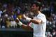 LONDON, ENGLAND - JULY 06: Novak Djokovic of Serbia celebrates winning the Gentlemen's Singles Final match against Roger Federer of Switzerland on day thirteen of the Wimbledon Lawn Tennis Championships at the All England Lawn Tennis and Croquet Club on July 6, 2014 in London, England. (Photo by Matthew Stockman/Getty Images)