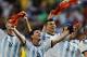 CORRECTS PHOTOGRAPHER'S BYLINE - Argentina's Lionel Messi and teammates celebrate at the end of the World Cup quarterfinal soccer match between Argentina and Belgium at the Estadio Nacional in Brasilia, Brazil, Saturday, July 5, 2014. Argentina won 1-0. (AP Photo/Eraldo Peres)