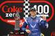 Aric Almirola celebrates in Victory Lane with the winning trophy after winning the NASCAR Sprint cup Series auto race at Daytona International Speedway in Daytona Beach, Fla., Sunday, July 6, 2014. (AP Photo/Terry Renna)