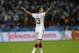 Germany's Thomas Mueller raises his arms after Germany defeated Algeria 2-1 in extra time during the World Cup round of 16 soccer match between Germany and Algeria at the Estadio Beira-Rio in Porto Alegre, Brazil, Monday, June 30, 2014. (AP Photo/Kirsty Wigglesworth)