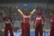 West Indies' captain Darren Sammy, center, celebrates with teammates the dismissal of Sri Lanka's Mahela Jayawardena during their ICC Twenty20 Cricket World Cup semi-final match in Dhaka, Bangladesh, Thursday, April 3, 2014. (AP Photo/Aijaz Rahi)
