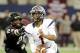 Allen quarterback Kyler Murray (1) runs upfield past Pearland Marlon Walls (28) in the first half during a UIL Class 5A Division I high school football championship game on Saturday Dec. 21, 2013, in Arlington, Texas. (AP Photo/Matt Strasen)