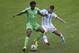 Nigeria's Efe Ambrose, left, and Argentina's Sergio Aguero battle for the ball during the group F World Cup soccer match between Nigeria and Argentina at the Estadio Beira-Rio in Porto Alegre, Brazil, Wednesday, June 25, 2014. (AP Photo/Michael Sohn)